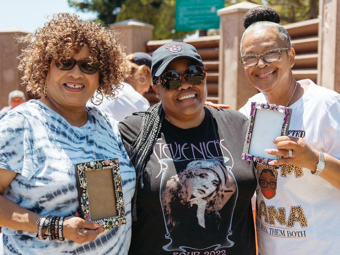 Khadafy Washington Project staff pictured smiling.