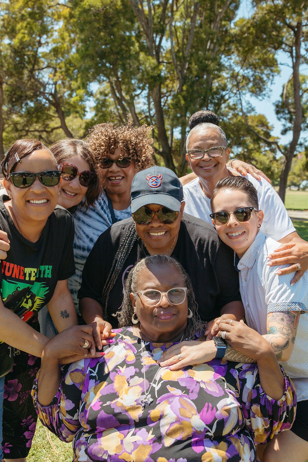 Marilyn Harris, Khadafy Washington Project founder, pictured with KWP staff.
