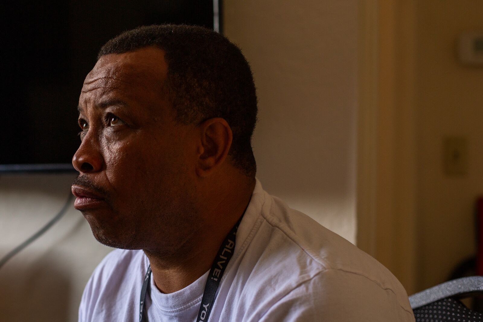 Photo of Violence Interrupter Doral Myles sitting looking to to the side